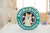 Coussin Shiba Inu Shibabucks sur la table